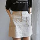 Buttoned Patch-pocket Miniskirt