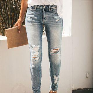 Distressed Low Rise Skinny Jeans
