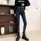 High-waist Belted Skinny Jeans