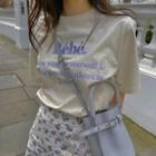 Elbow-sleeve Letter Embroidered T-shirt / Floral Print Mini A-line Skirt