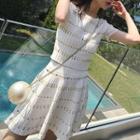 Set: Short-sleeve Cropped Knit Top + Knit Mini A-line Skirt