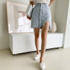 Buttoned Distressed Denim Miniskirt