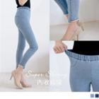 Asymmetric Fray Hem Elastic-waist Skinny Jeans