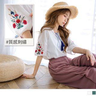Tie-neck Tasseled Embroidered Elbow-sleeve Top