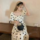 Puff-sleeve Dotted Midi A-line Dress Black Dot - Beige - One Size