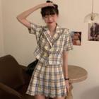 Short-sleeve Double Breasted Plaid Top / Pleated Skirt