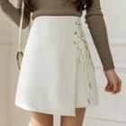 High-waist Asymmetrical Hem Lace-up Mini Skirt