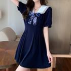 Short-sleeve Bow Accent Collared A-line Dress