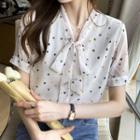 Short-sleeve Tie-neck Heart Print Blouse