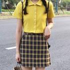 Collared Short-sleeve T-shirt / Plaid A-line Skirt