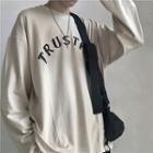 Lettering Loose-fit Long-sleeve T-shirt Light Almond - One Size