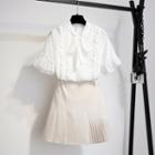 Set: Short-sleeve Ribbon-neck Top + Pleated Skirt