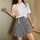 Plain Short-sleeve Polo Shirt / Cut Out Plaid Pleated Skirt
