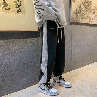 Lettering Print Button-accent Harem Pants
