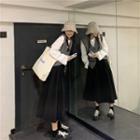 Long-sleeve T-shirt / Midi A-line Skirt / Buttoned Knit Vest