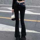 High-waist Asymmetric Cut-out Jeans