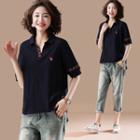 Short-sleeve Embroidered Notched Top