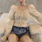 Long-sleeve Off-shoulder Shirred Crop Top Beige Almond - One Size