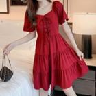 Short-sleeve Lace-up Tiered A-line Dress