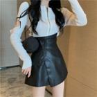 Long-sleeve Cut-out Knit Top / Buttoned Skort
