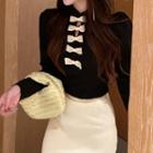 Long-sleeve Bow Accent Cutout Top