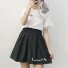 Short-sleeve Top / Embroidered Suspender Skirt