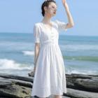 Short-sleeve Eyelet Lace Buttoned A-line Midi Dress