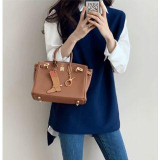 Dip-back Boxy Knit Vest