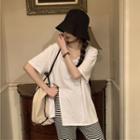 Short-sleeve Slit T-shirt / Ribbed Wide Leg Pants
