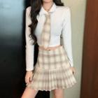Long-sleeve T-shirt / Plaid Mini A-line Pleated Skirt