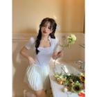 Square-neck Cropped T-shirt / Pleated Mini A-line Skirt