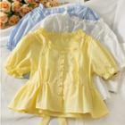 Ribbon-back Ruffle-trim Peplum Top
