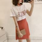Set: Embroidered Short-sleeve T-shirt + Asymmetric Skirt