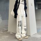 Checkerboard Heart Print Straight Leg Jeans