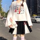 Graphic Print Tasseled Hoodie / Frog-buttoned Mini A-line Skirt