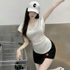 Cap-sleeve T-shirt / Asymmetrical Skort