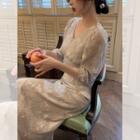 3/4-sleeve V-neck Floral Top / Midi A-line Skirt