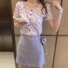 Floral Short-sleeve Top / Plain A-line Skirt