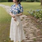 Set: Short-sleeve Floral Shirt + A-line Midi Skirt
