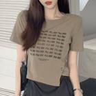 Short-sleeve Asymmetrical Lettering Crop Top