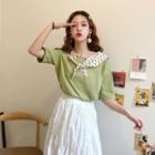 Tie Neck Short-sleeve T-shirt / A-line Midi Skirt