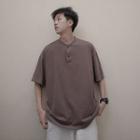 Loose-fit Henley T-shirt