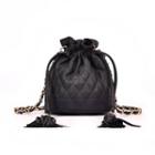 Quilted Bucket Bag With Tassel