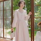 Long-sleeve Ruffled Tie-front Midi A-line Dress