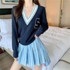 V-neck Sweater / Striped Pleated Skirt