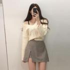 V-neck Cable Knit Sweater / Slit Mini A-line Skirt