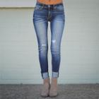 Low-rise Ripped Skinny-fit Jeans