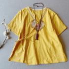 Short-sleeve Embroidered Wrap Blouse