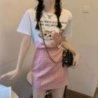 Short-sleeve Cat Print T-shirt / High-waist Plaid Mini Skirt