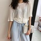 Elbow-sleeve T-shirt / Wide-leg Cropped Pants